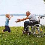 A child runs to his grandfather